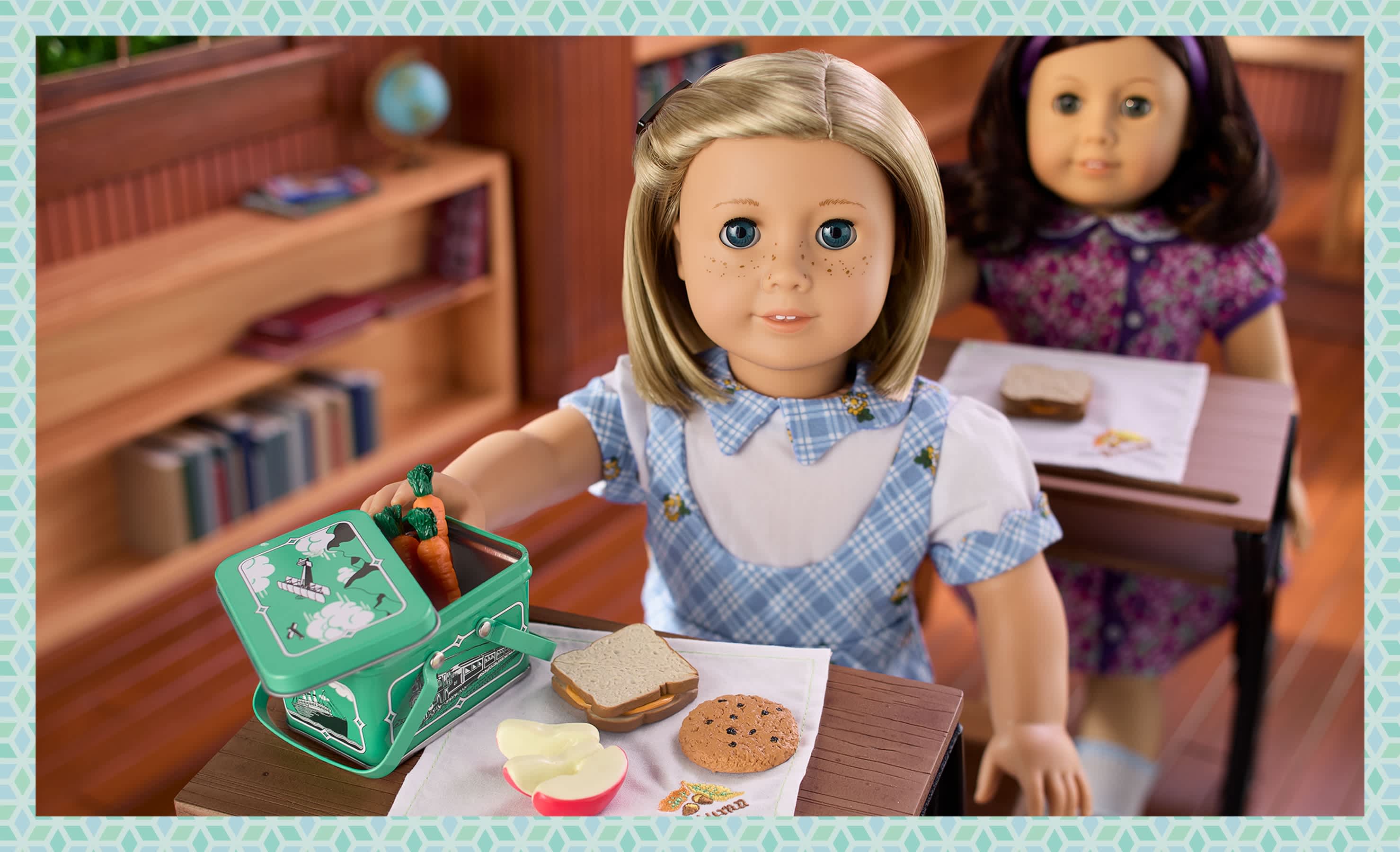 Kit sitting at a school desk