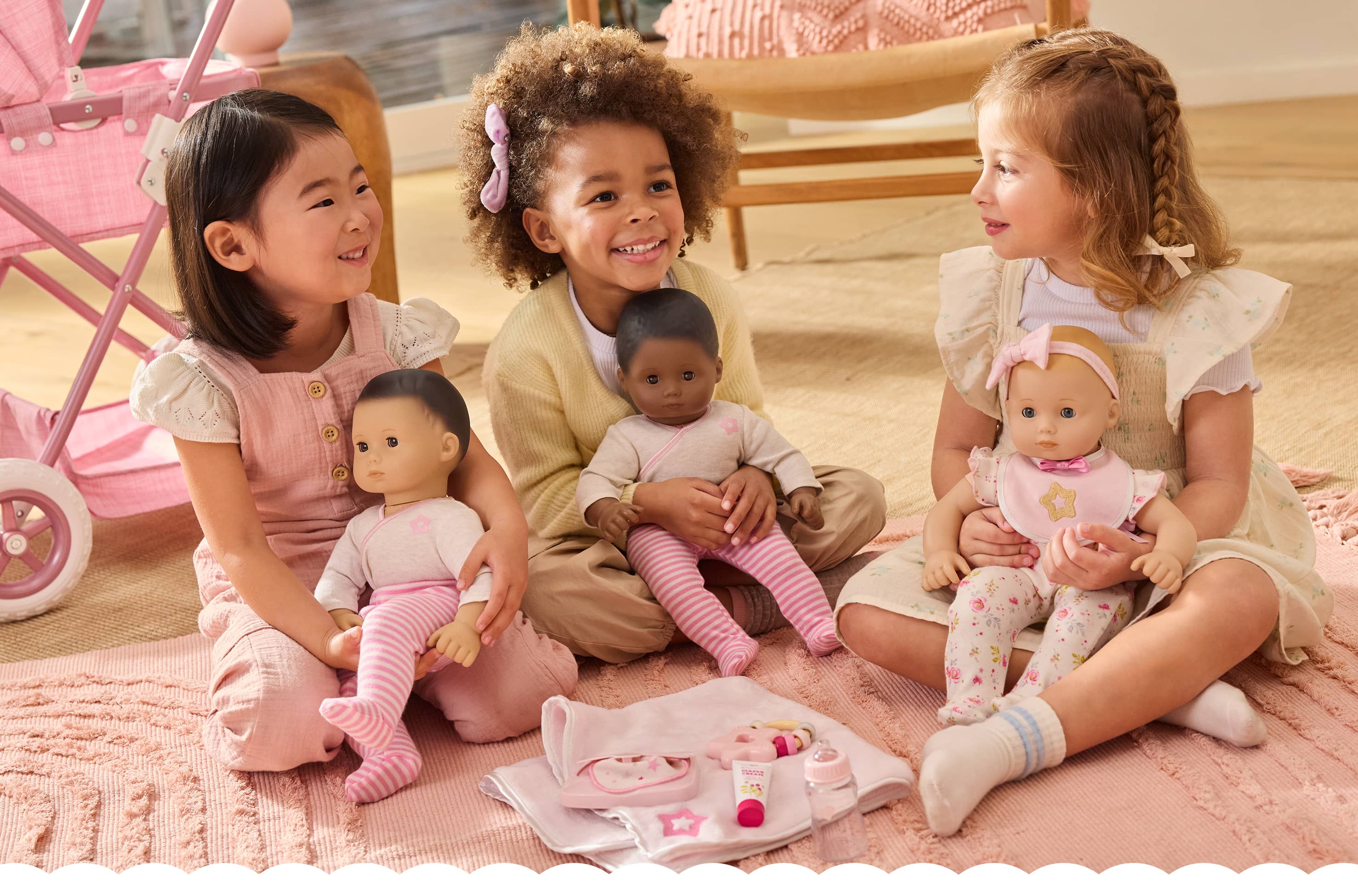 Girls holding Bitty Baby Splash pool